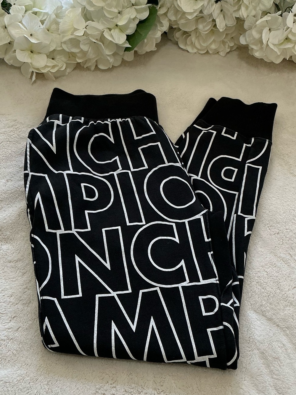 Champion Reverse Weave Black Joggers with White Allover Logo Print